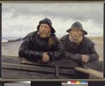 Two bearded men in black rain coats and rain caps lean against the edge of a wooden fishing boat lying on the beach and look thoughtfully into the distance