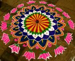 Colorful Kolam pattern, resembling a flower