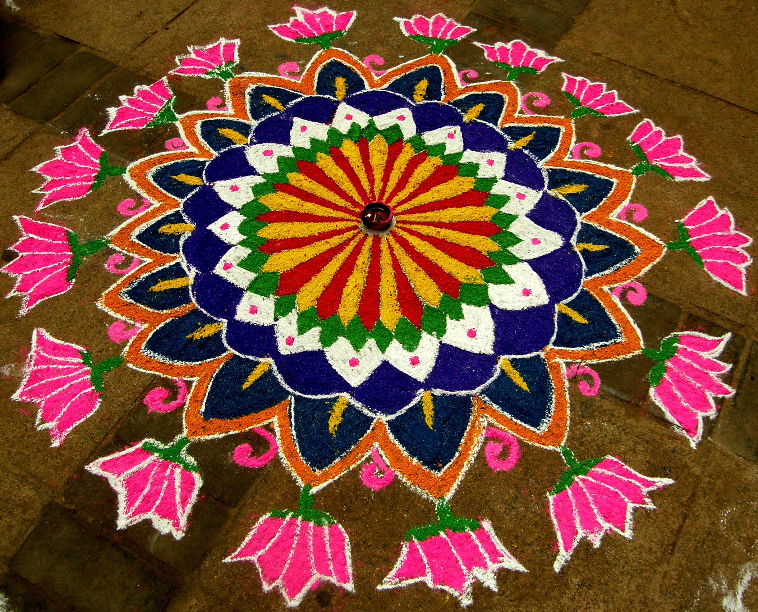 Colorful Kolam pattern, resembling a flower